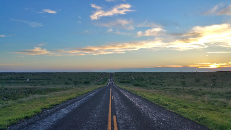 deserted road in Utah and sunset