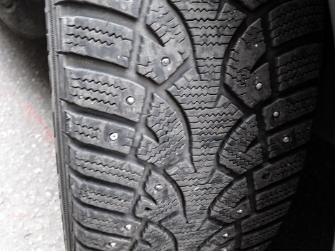 studded snow tire at a shop in Bountiful, UT